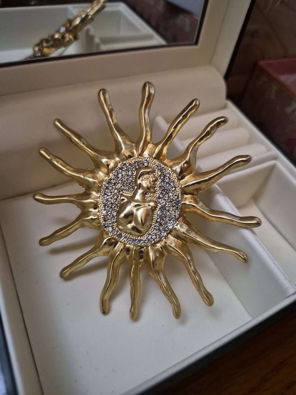 Gold Sunburst Woman Medallion Brooch with Crystal Halo
